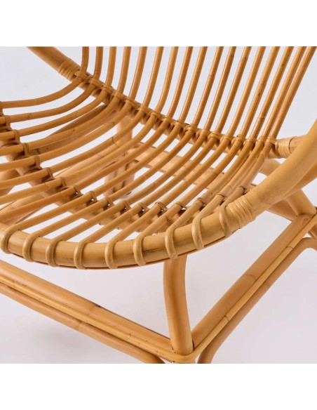 Close-up detail of rattan cane on shell chair