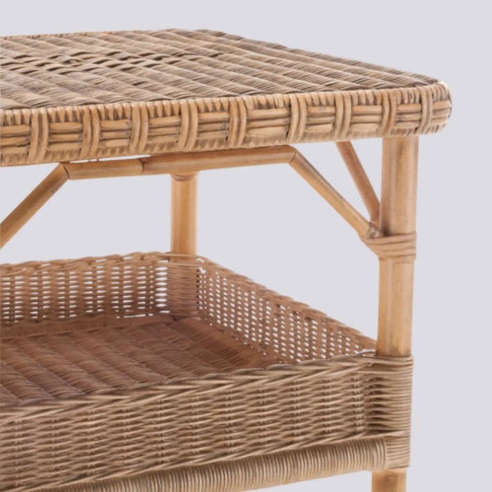 Detail of woven weathered rattan square coffee table Nantucket