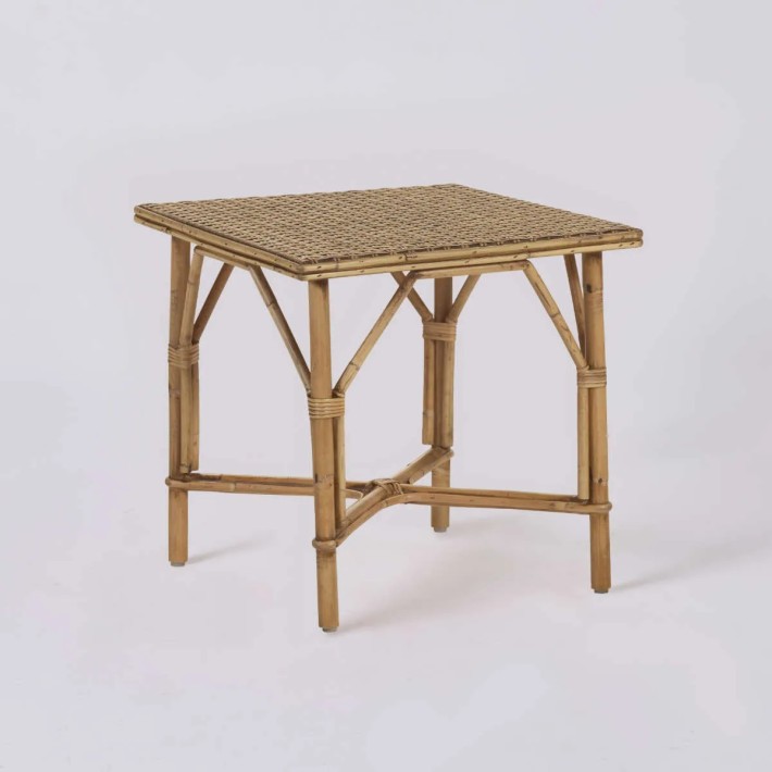 Grandmother-style woven patinated rattan coffee table by KOK Maison