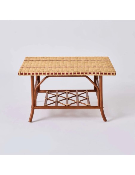 Side view of the BAGATELLE rectangular coffee table in distressed rattan at Kok Maison