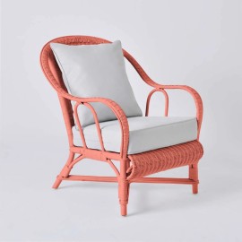 PRIMAVERA collection armchair in coral-coloured lacquered rattan