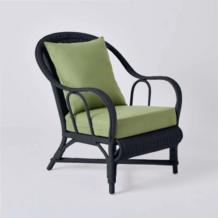 Fauteuil collection PRIMAVERA en rotin laqué couleur noir tissu vert