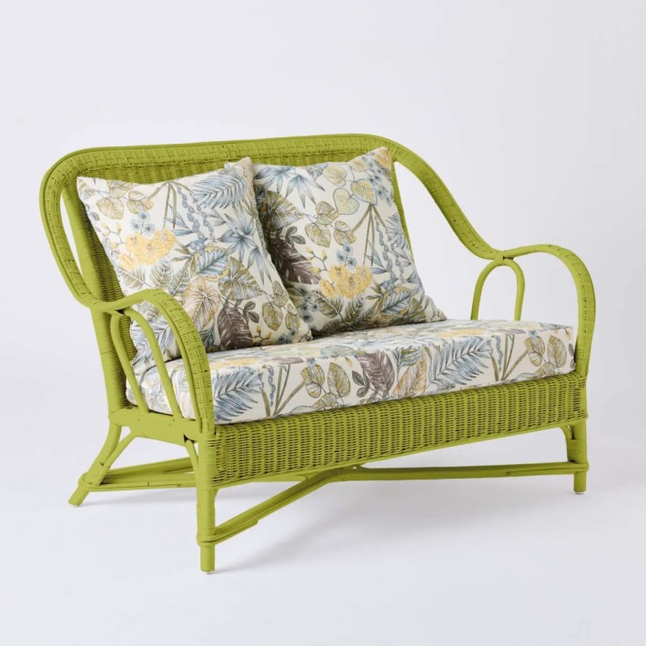 2-seater sofa from the PRIMAVERA collection in grass green lacquered rattan with ecru bouquet fabric