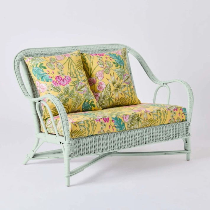 2-seater sofa from the PRIMAVERA collection in pistachio lacquered rattan with bouquet yellow fabric