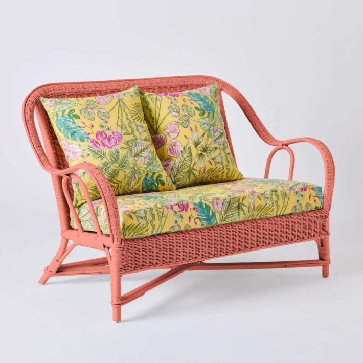 PRIMAVERA collection 2-seater sofa in coral lacquered rattan with bouquet yellow fabric