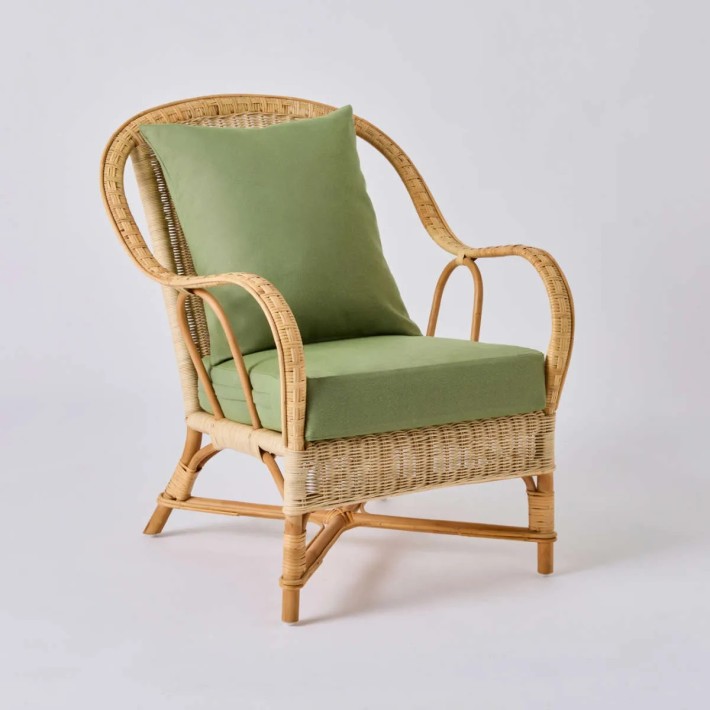 NANTUCKET woven rattan armchair with green striped fabric