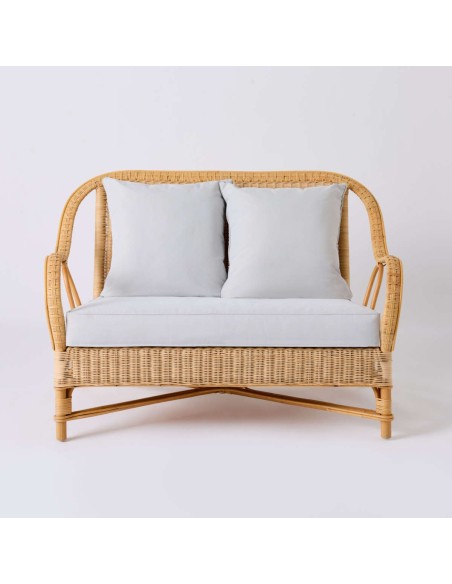 Front view of NANTUCKET natural rattan sofa from the Grandfather collection in pearl grey fabric
