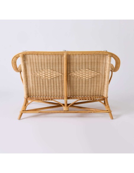 Rear view of NANTUCKET natural rattan sofa from the Grandfather collection in pearl grey fabric