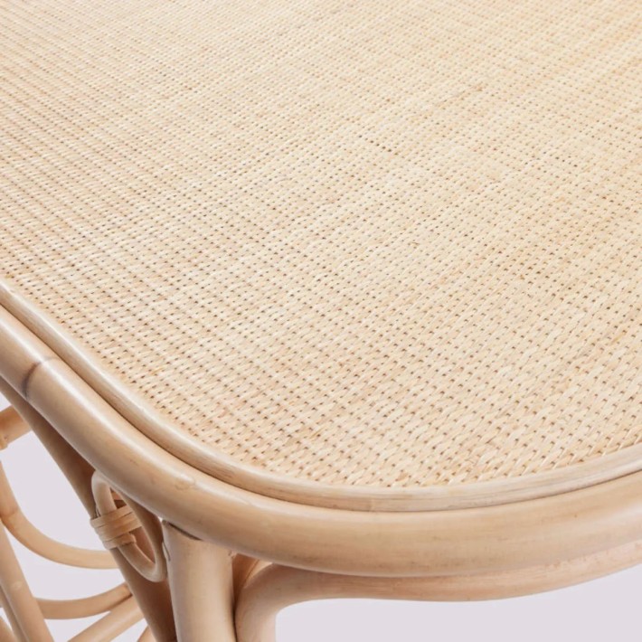 Close-up of the rattan weave on the tabletop of the GINGKO oval table