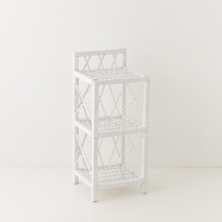 Small white lacquered willow shelving unit