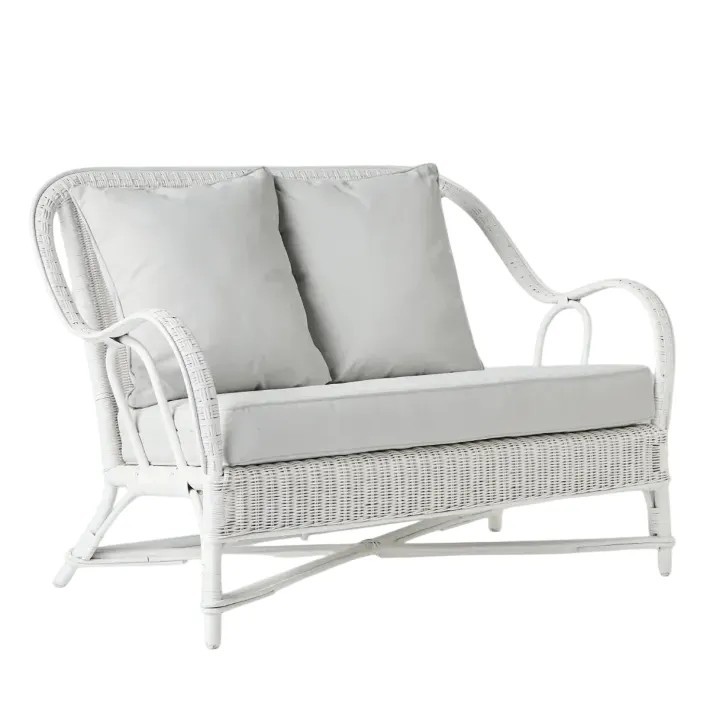 Primavera white lacquered rattan sofa with cushions