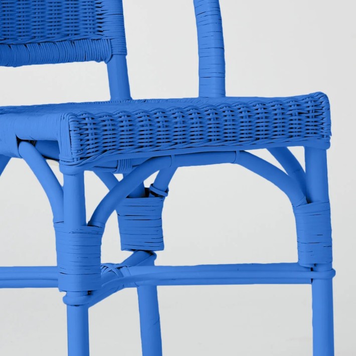 Primavera-coloured lacquered woven rattan chair