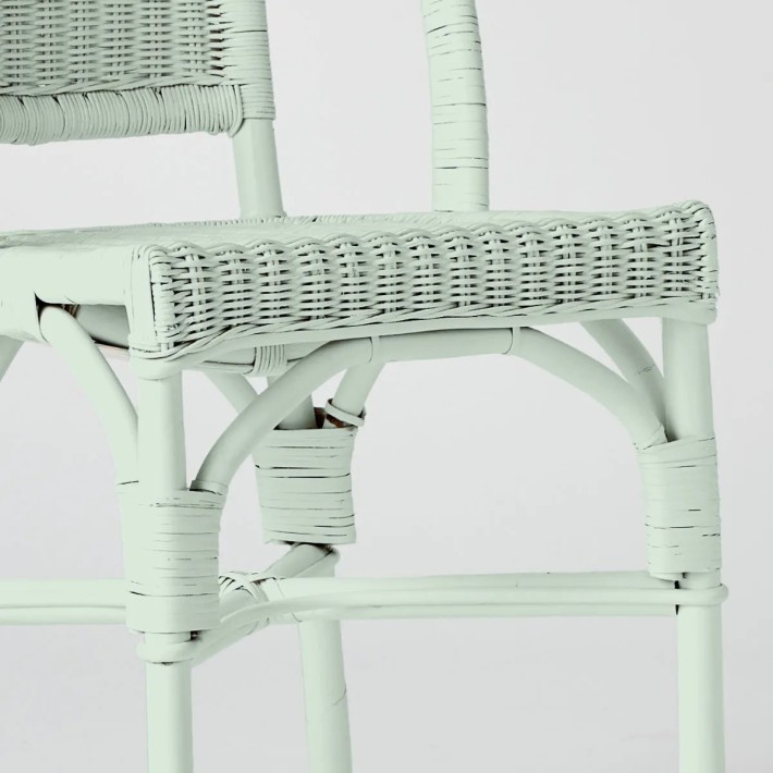 Primavera-coloured lacquered woven rattan chair
