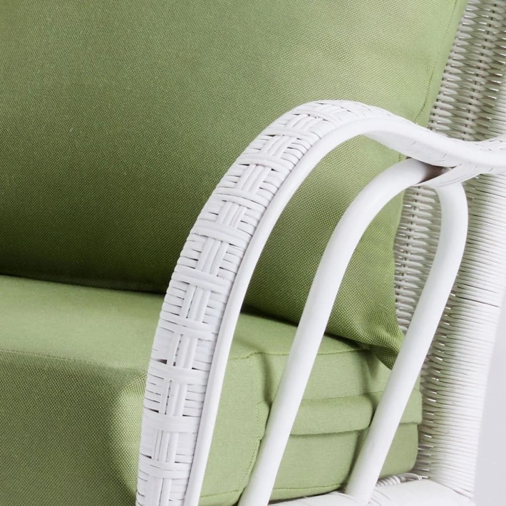 Primavera white lacquered rattan sofa with cushions