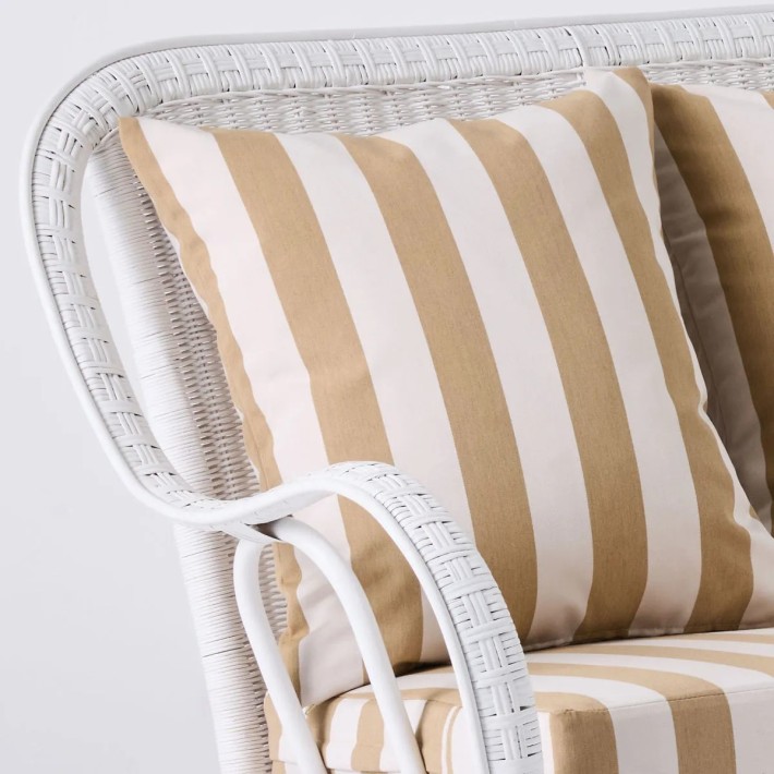 Primavera white lacquered rattan sofa with cushions