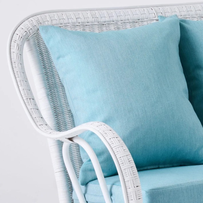 Primavera white lacquered rattan sofa with cushions