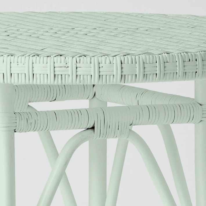 Primavera-coloured lacquered woven rattan table