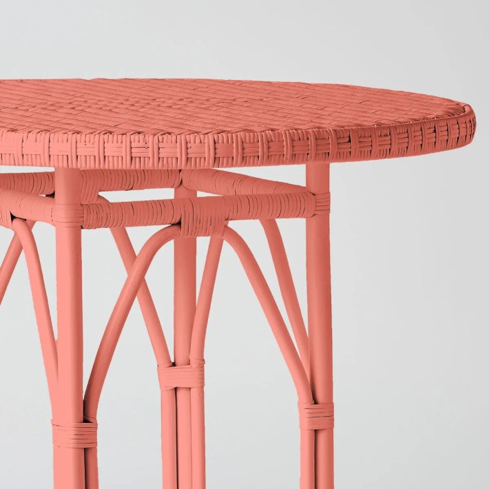 Primavera-coloured lacquered woven rattan table