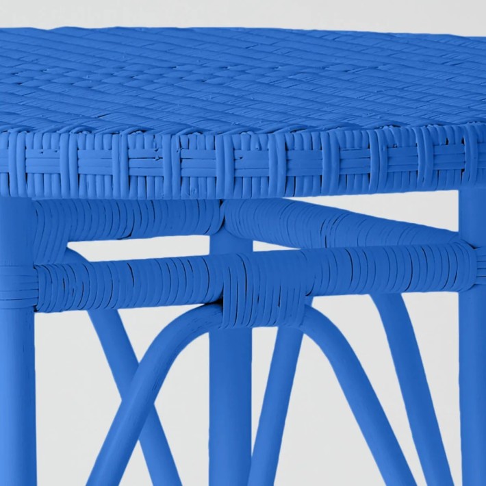 Primavera-coloured lacquered woven rattan table