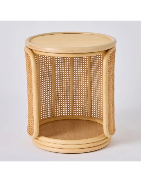 Front view of a rattan tambourine-style bedside table with a rattan top