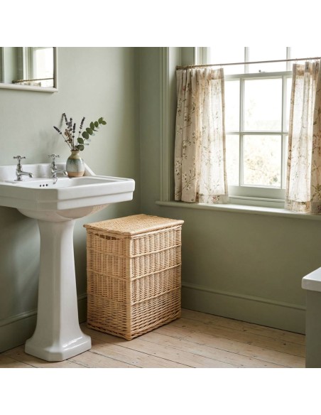 Large rectangular white wicker laundry basket