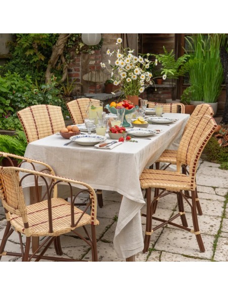 Resin garden chair around a table from the BELLE EPOQUE collection