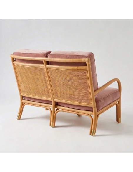 Rear view of the RIVIERA rattan sofa in pink velvet