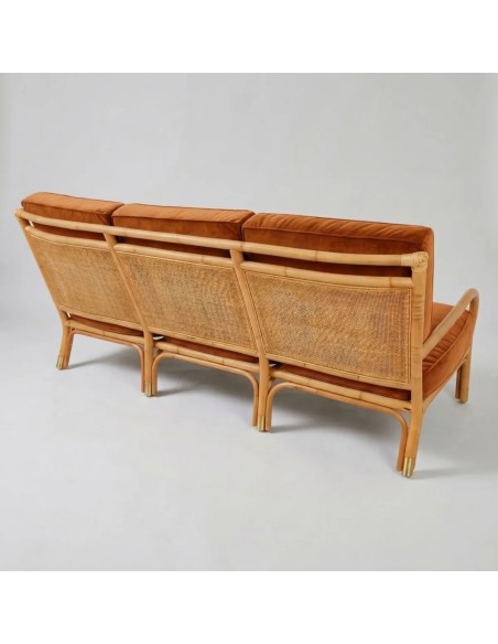 Rear view of a 3-seater rattan sofa from the RVIERA collection, in ochre velvet