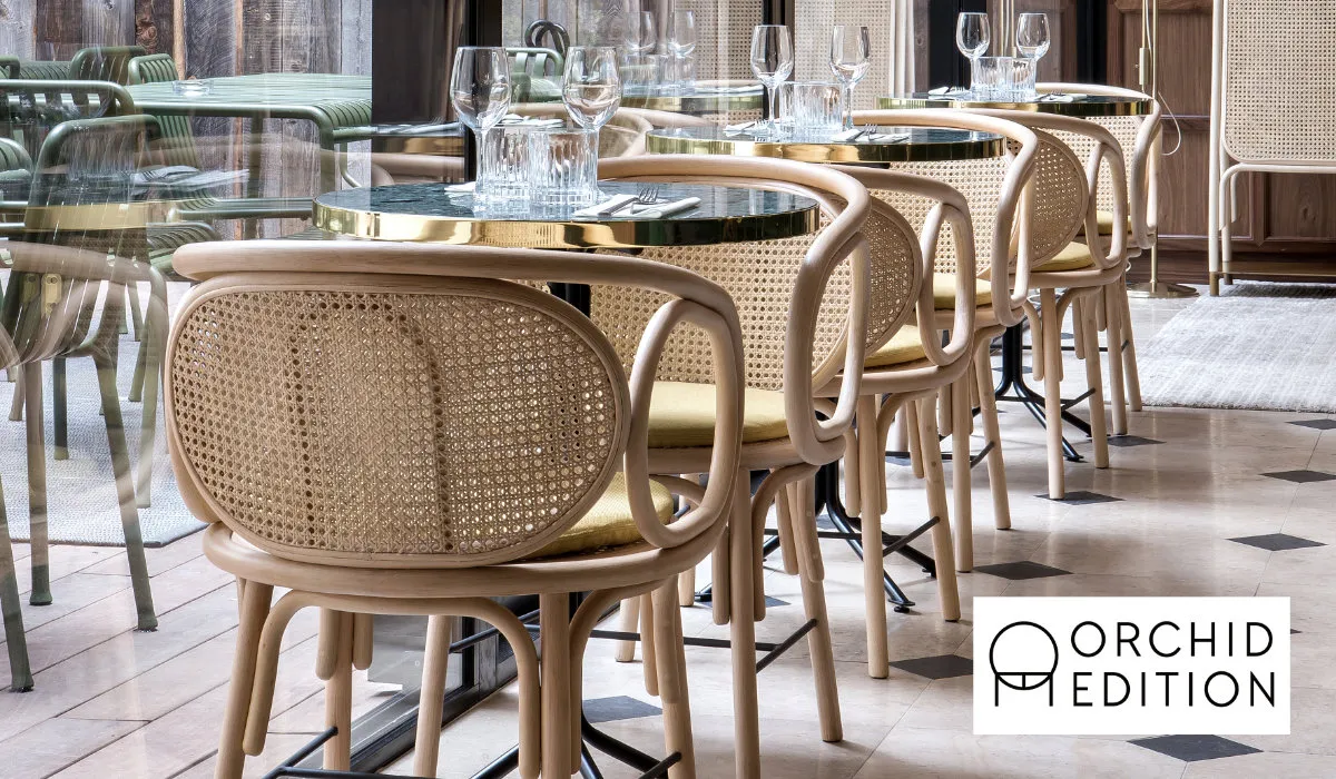 Orchid Edition : Contour rattan armchair in a restaurant